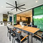 Contemporary Naples Home With Outdoor Kitchen And Pool