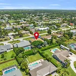 Salt Water Heated Pool Home With A Tiki Bar, A Garage Game Room And 4 Bikes