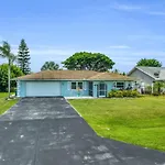 Salt Water Heated Pool Home With A Tiki Bar, A Garage Game Room And 4 Bikes
