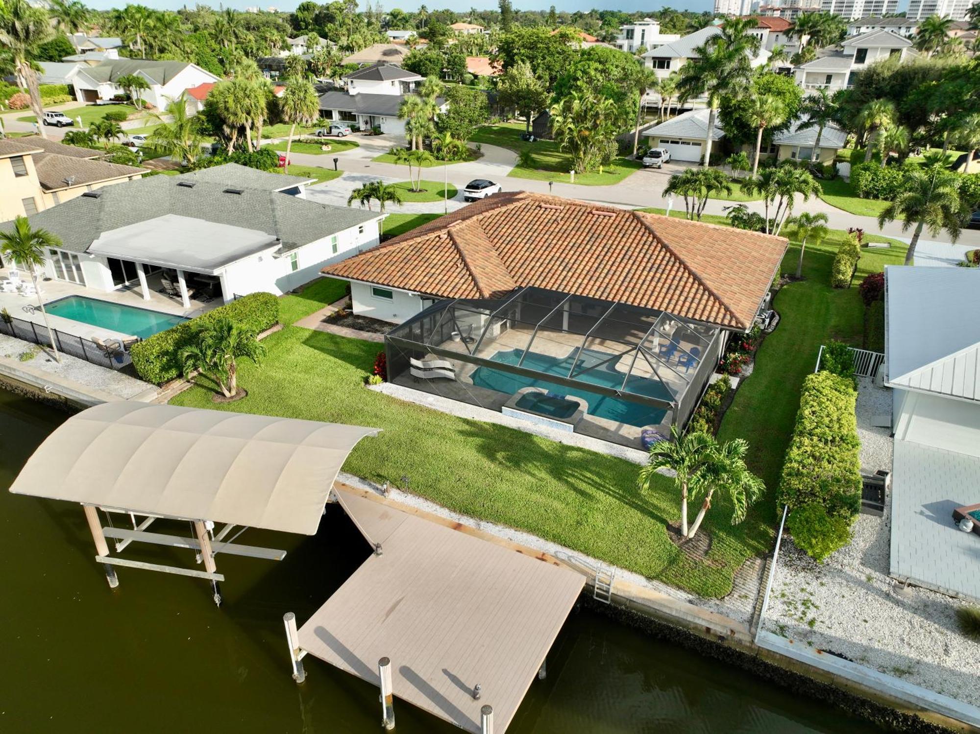 Holiday home Sunsation On The Water! - Walk To Vanderbilt Beach! Salt Water Pool! Naples